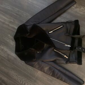 Black Leather Jacket with Zipper Detail